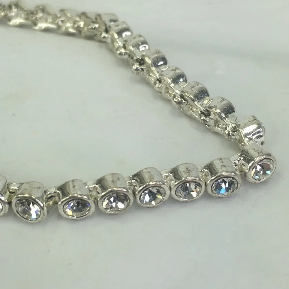 Cubic zirconia tennis bracelet silver tone 7.25” long - Picture 6 of 8
